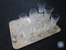 A tray of fourteen assorted Waterford Crystal glasses