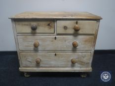 A Victorian pine four drawer chest