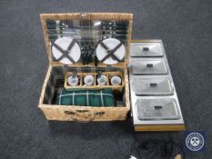 An Ecko counter top hostess plate together with a wicker picnic hamper