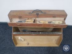 A mid 20th century joiner's tool box with hand tools