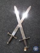 A pair of English made short swords