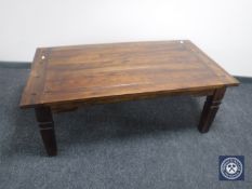 A contemporary hardwood coffee table