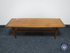 A Danish teak coffee table with undershelf by Myer