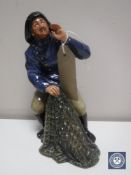 A Royal Doulton figure - Sea Harvest,