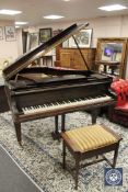 A mahogany baby grand piano by Chappell, length 150cm, with stool.
