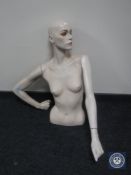 A 20th century female mannequin torso
