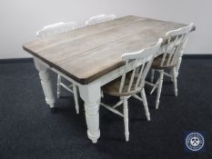 An antique pine farmhouse kitchen table with two drawers on painted base and four antique part