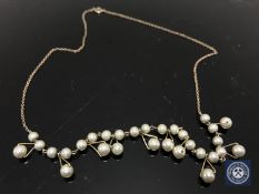 A 9ct gold necklace with simulated pearls