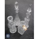 Four lead crystal decanters with stoppers