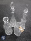 Four lead crystal decanters with stoppers