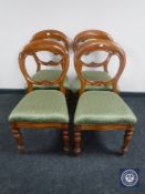 A set of four Victorian mahogany balloon back chairs