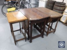 An oak gateleg table together with a mahogany gateleg table and an oak barley twist occasional