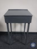 A mid 20th century painted child's school desk