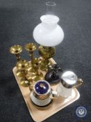 A tray of brass Duplex oil lamp, four graduated candlesticks,