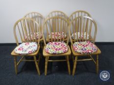 A set of six contemporary kitchen chairs with cushions