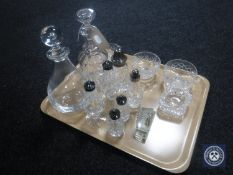 A tray of assorted glass ware, sugar sifter, part cruet set, decanters,
