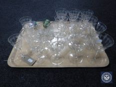 A tray of assorted etched glasses, pair of salts,