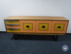 A 20th century teak oak sideboard with painted doors and drawers CONDITION REPORT: