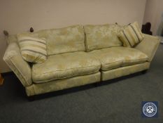 A Barker & Stonehouse drop-end four-seater settee with scatter cushions,