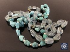 A turquoise and cultured pearl necklace and an aquamarine necklace,