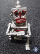 A cast metal robot money box
