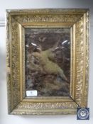 A Victorian gilt framed chrystoleum depicting a lady reclining on a branch