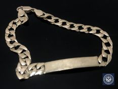 A 9ct gold identity bracelet CONDITION REPORT: 5.