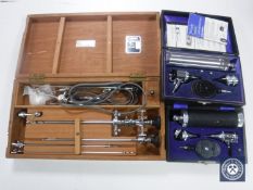 Three cased medical instruments