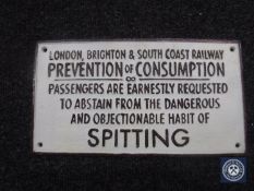 A cast metal plaque - railway spitting notice