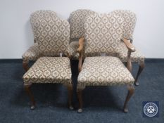 A set of five walnut tapestry upholstered Queen Anne style chairs
