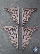 Four cast metal wall brackets