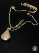 A 9ct gold pendant on chain CONDITION REPORT: 3.