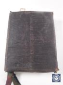 A leather bound volume, The Altar of the Household by The Reverend Dr Harris,