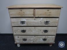 A Victorian pine five drawer chest