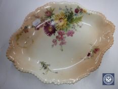 A Royal Worcester hand painted shaped shallow dish