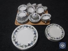 A sixty-piece Royal Doulton Burgundy tea and dinner service