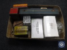 A box of vintage tins, Brownie cameras, mid 20th century mincer, assorted glass ware,