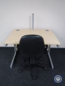 An office work station and swivel office armchair