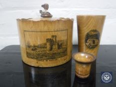 A Victorian Mauchlineware Tower of Refuge lidded spice box and a similar beaker beaker