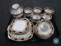 A tray of twenty-two pieces of Rosalind tea china