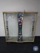 A melamine topped display cabinet