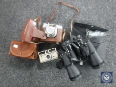 A set of cased Prisma binoculars, small box, two vintage cameras and a tray of miniature tankards,