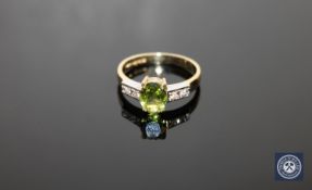 An 18ct gold peridot and diamond ring,