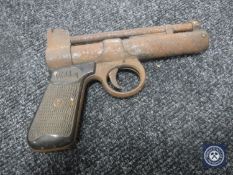 A vintage Webley air pistol CONDITION REPORT: Both grips are present and intact.