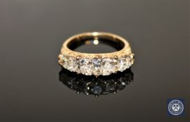 A five-stone old cut diamond ring, the total diamond weight estimated at 1.