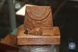A Mouseman style oak fob watch stand