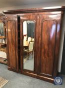 A Victorian mahogany triple-door wardrobe,