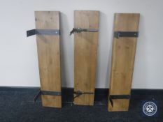Three pine wall shelves with metal fixing brackets