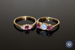 Two 18ct gold opal set rings