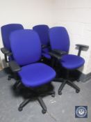 Four adjustable office armchairs and two Fellows flex arm copy holders